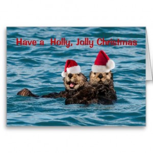 otters in santa hats