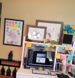 Liana Brooks's office, which is rather messy and obviously a place where someone does creative work